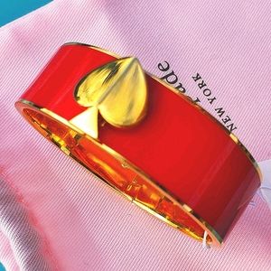 Kate Spade NY Enamel Spade Bangle Bracelet In Red
